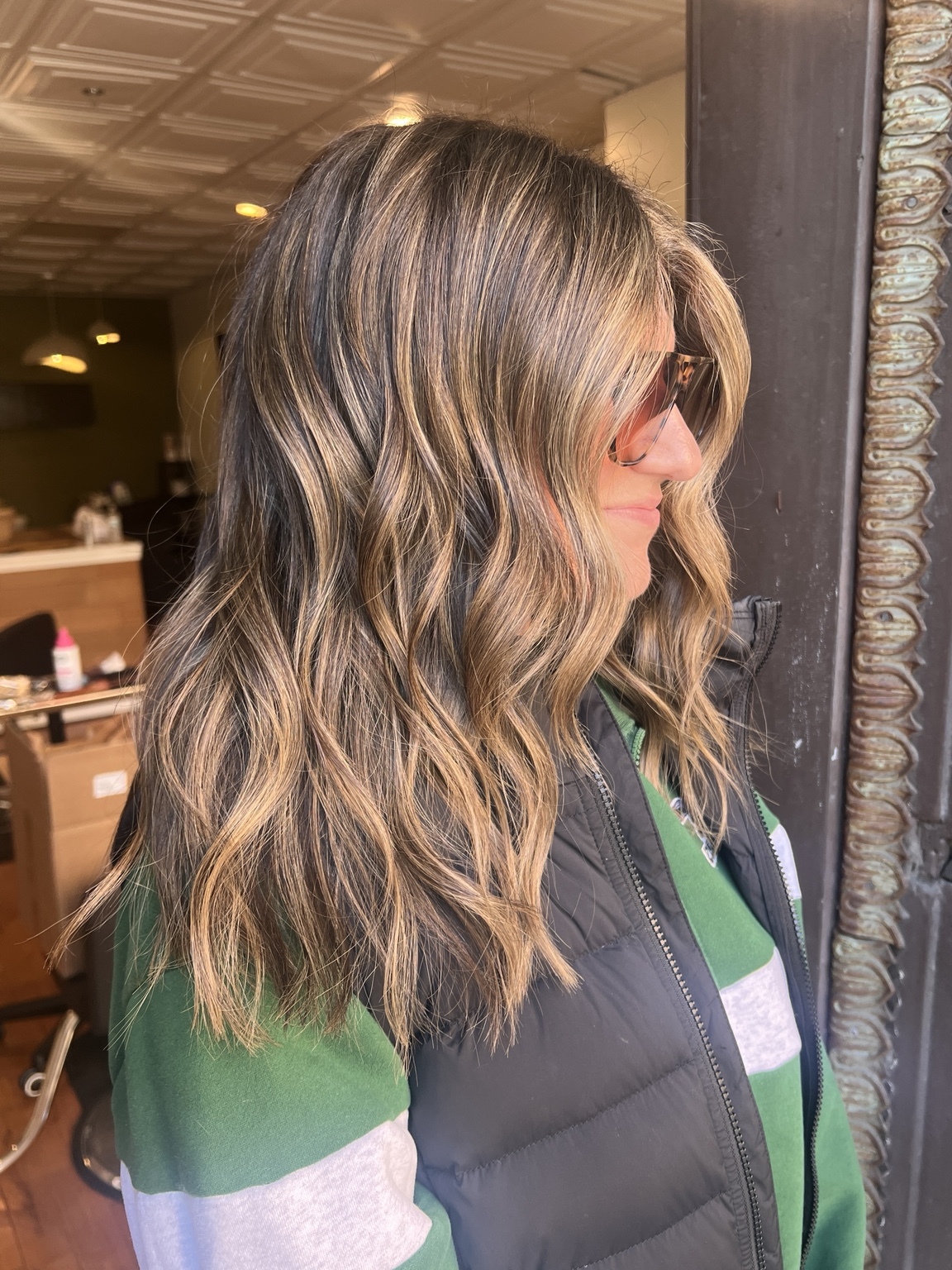 Dimensional bronde color styled in loose waves